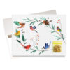 "Happy bird day" birthday card features colorful illustrated birds with a tiny packet of real bird seed