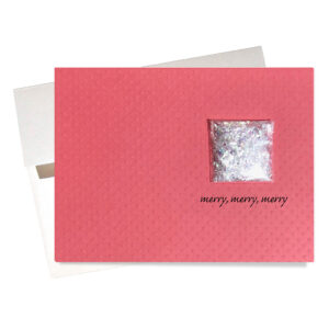 Handcrafted Christmas card features packet of glitter