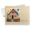 "Welcome home!" New Home Card features a creative-looking folk art home and the message "Welcome home!"