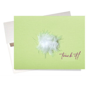 "Warm & Fuzzy" Birthday Card gives the soft touch of a feather boa with the message "touch it!" on the front